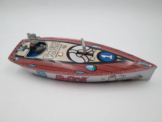 Lancha rápida Popeye. Hojalata litografiada. Cuerda manual. Schylling. EEUU. 1996 Lancha rápida Popeye. Hojalata litografiada. Cuerda manual. Schylling. EEUU. 1996